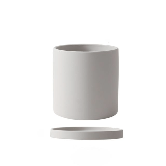 Decoratieve plantenpot, perfect voor binnen, met stevige schotel voor waterbeheer.
