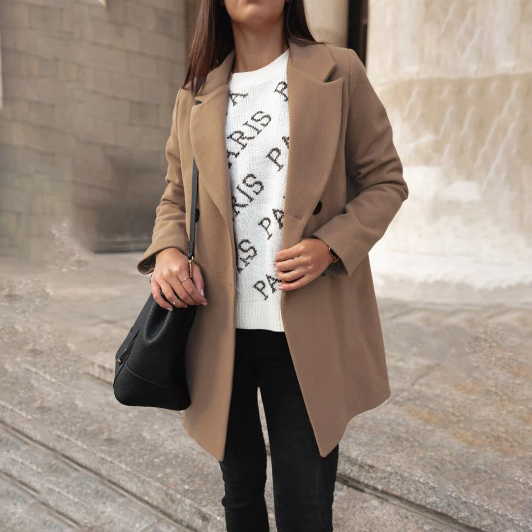 Elegante Hoymans dames manteljas, klassiek en tijdloos model voor een stijlvolle look.