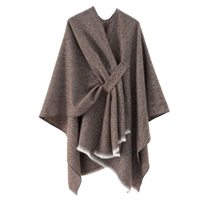 Elegante dames vest-poncho, zacht kasjmier look en comfortabele retro chic.