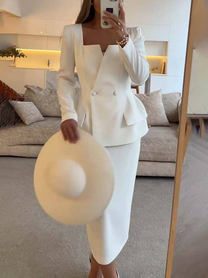Zakelijke outfit: comfortabele zwarte blazer en flowy lange rok. Geschikt voor elke professionele setting.