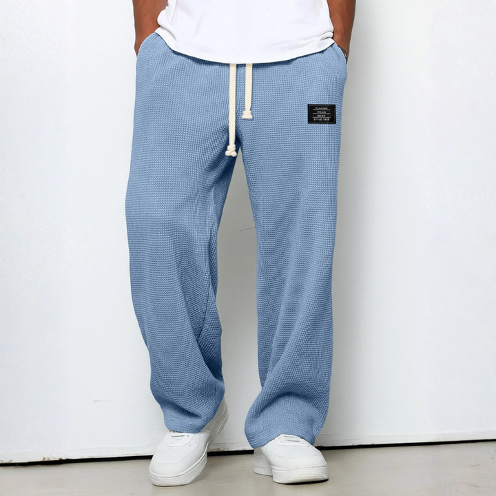 Heren wafelbroek met trekkoord, perfect voor relaxte dagen. Comfortabele casual broek met stijlvolle rechte pijpen.