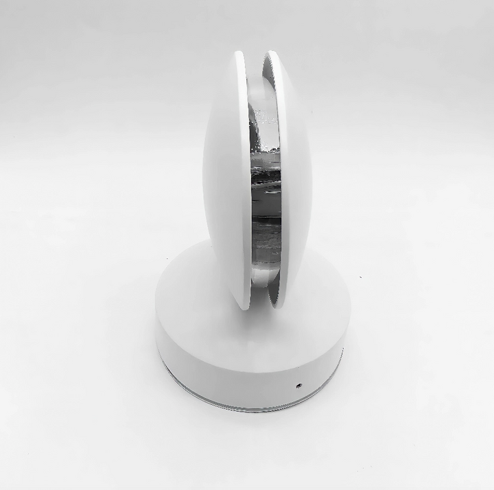 Kleurrijke en dimbare Lumovibe 360° slimme LED projectielamp, app-gestuurd voor ultieme sfeerverlichting.