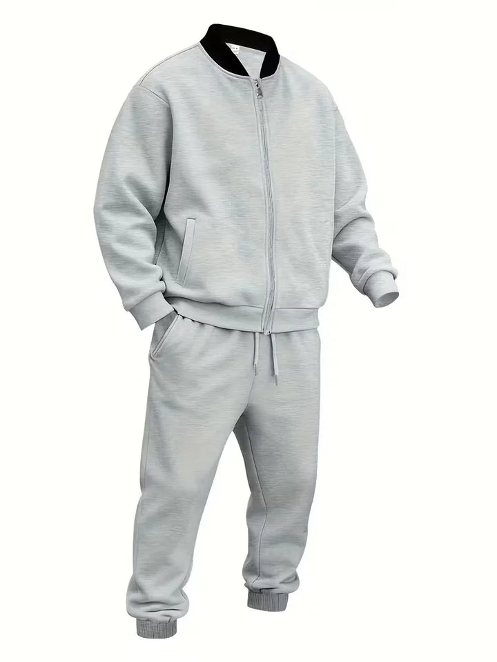 Trendy polyester heren set: jas met rits en sportieve broek.