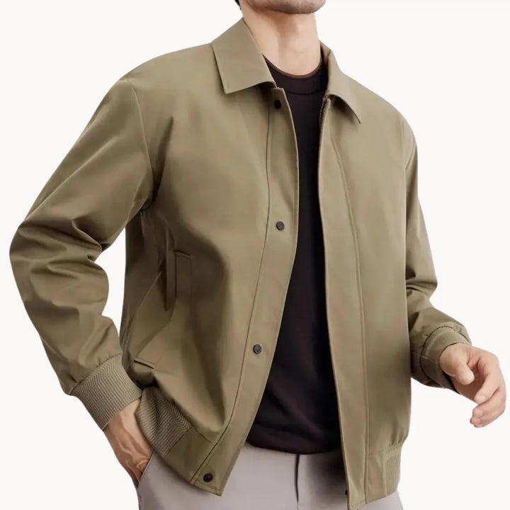 Elegante heren casual jas met knopen, elastische boord en een modieuze uitstraling.