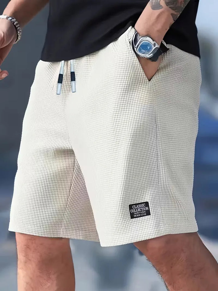 Heren casual shorts met trekkoord en zakken, perfect voor zomer en vrije tijd.