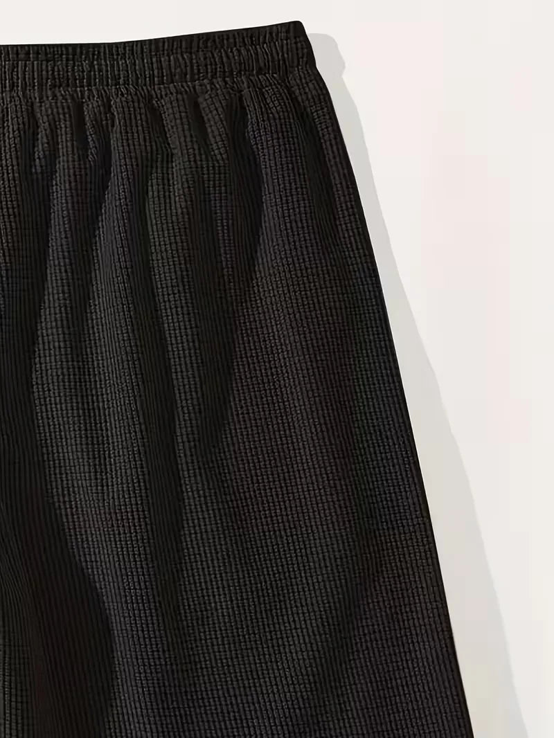 Korte broek heren, casual, met trekkoord en ruime zakken, perfect voor vrije tijd.