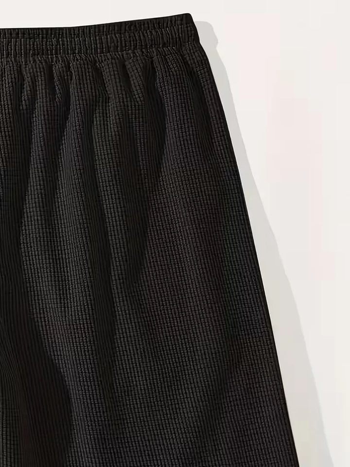 Korte broek heren, casual, met trekkoord en ruime zakken, perfect voor vrije tijd.