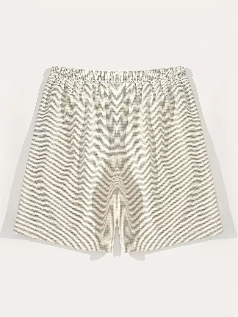 Moderne heren shorts, blauw, met trekkoord en praktische zijzakken.