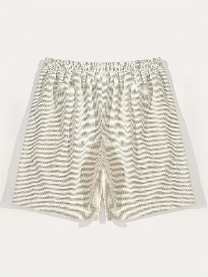 Moderne heren shorts, blauw, met trekkoord en praktische zijzakken.