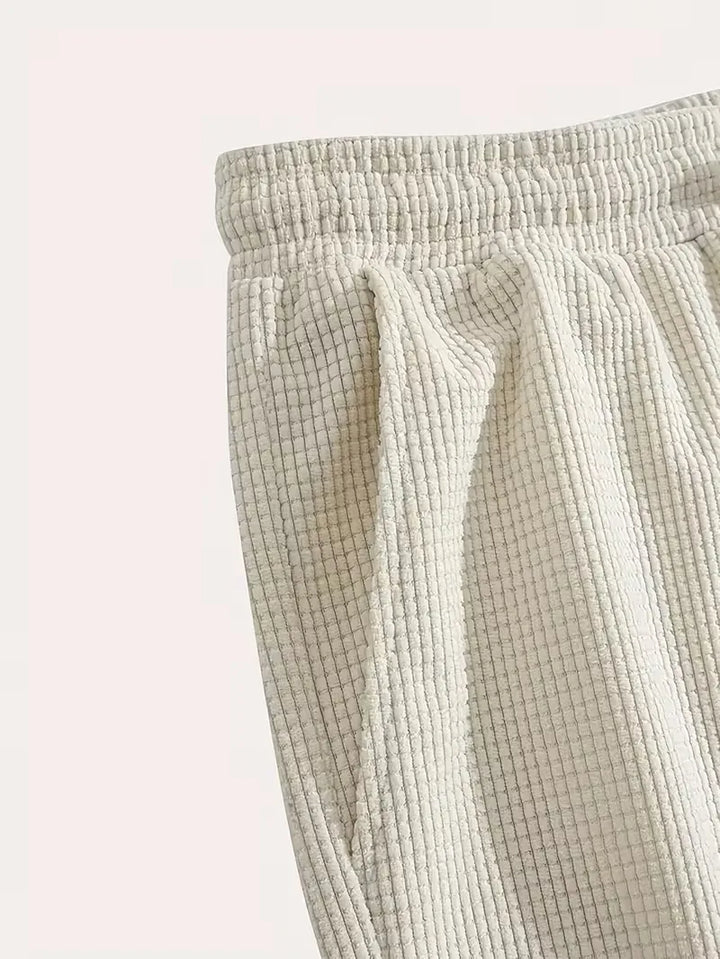 Stijlvolle heren zomer shorts, comfortabel en ademend, met trekkoord en zakken.