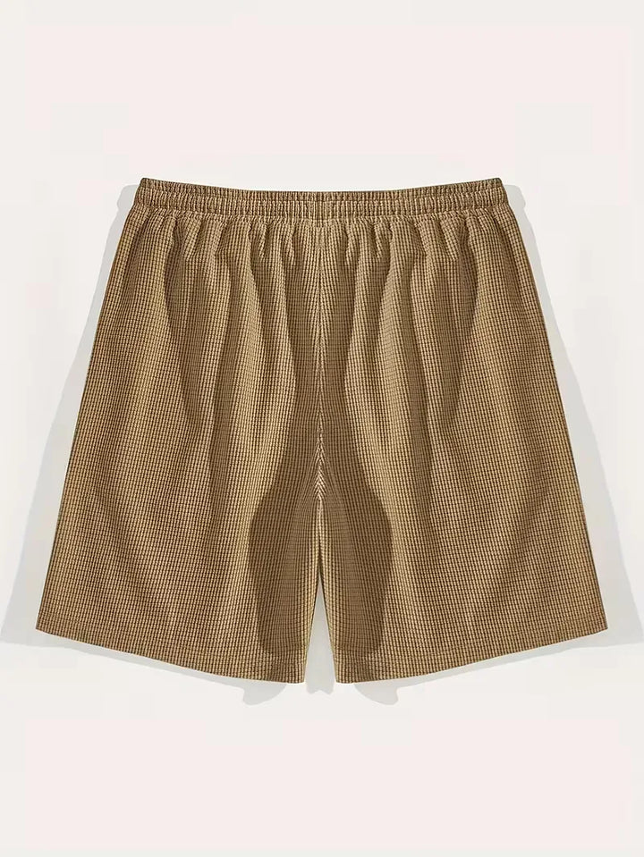 Marineblauwe heren vrijetijdsshorts met trekkoord voor een relaxte, comfortabele look.