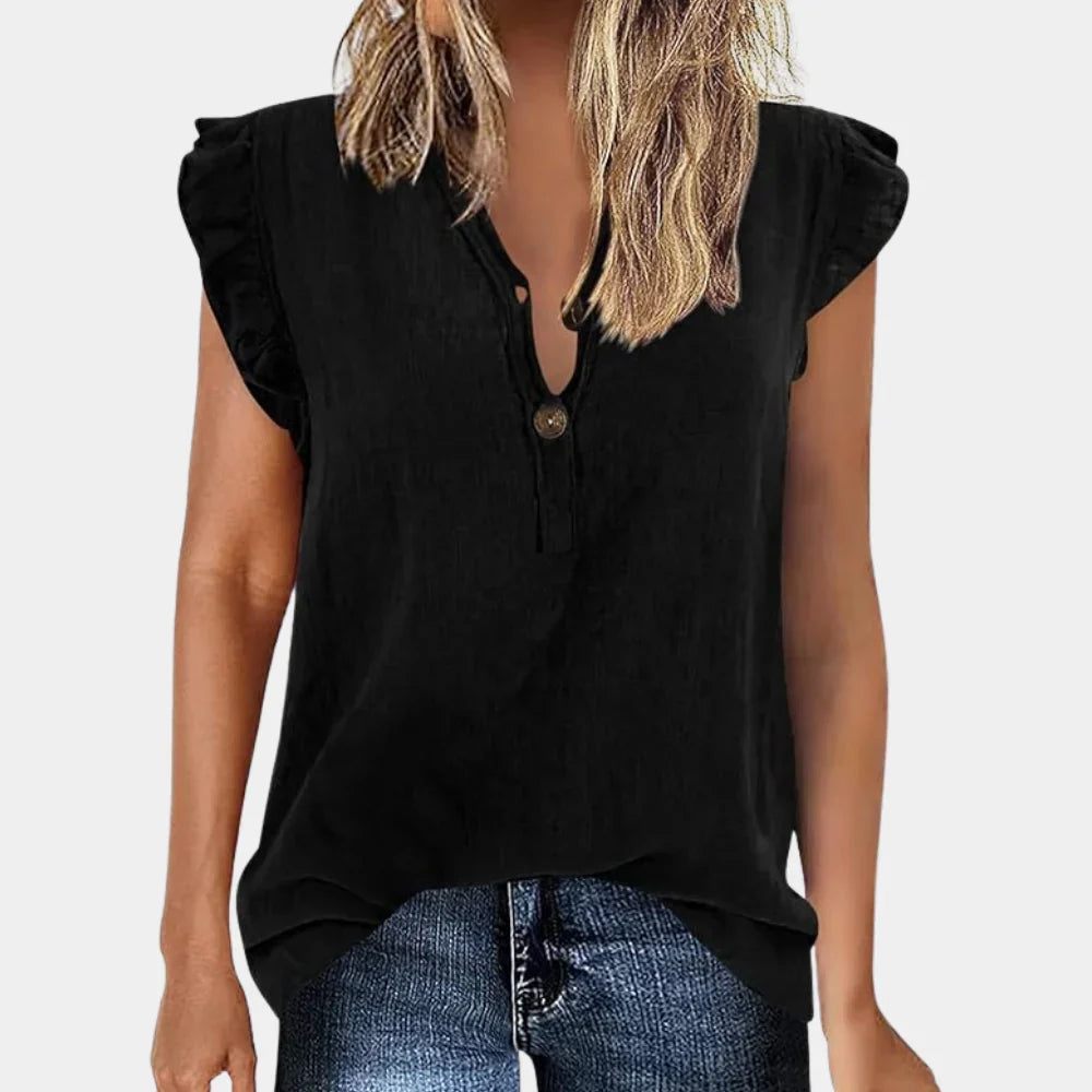 Modieuze dames zomerblouse met knoopsluiting en losse pasvorm, casual en elegant voor elke gelegenheid.