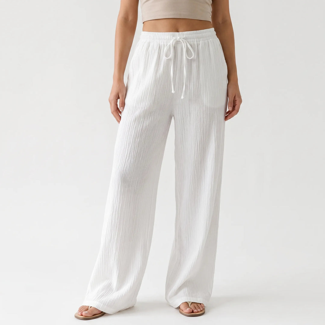 Comfortabele damesbroek: palazzo met wijde pijpen en elastische taille, perfect voor warme dagen.