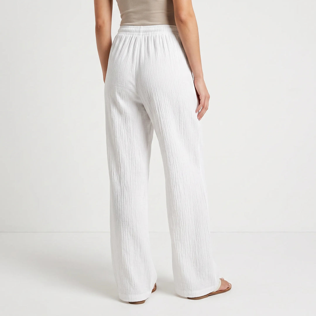 Stijlvolle dames palazzo broek met wijde pijpen en elastische taille, veelzijdig voor elke gelegenheid.