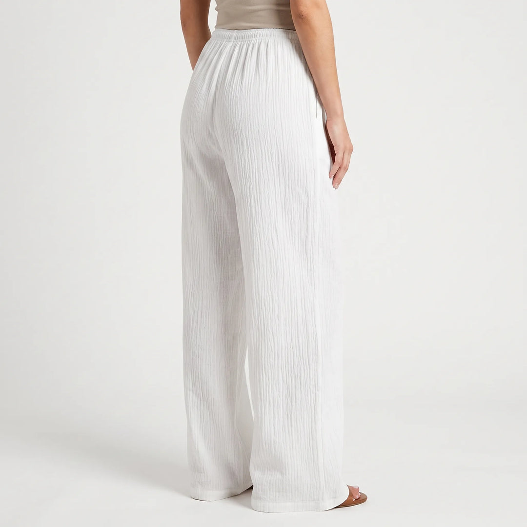 Casual dames zomerbroek: palazzo model met wijde pijpen en comfortabele elastische taille.