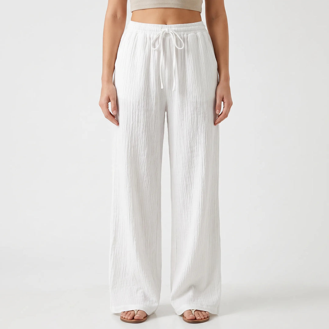 Zwarte dames palazzo broek met wijde pijpen, elastische taille en trekkoord, casual chic.