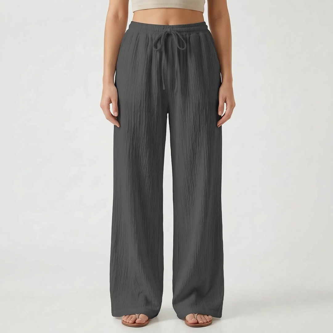 Ademende dames palazzo broek met wijde pijpen en elastische taille, ideaal voor casual outfits.