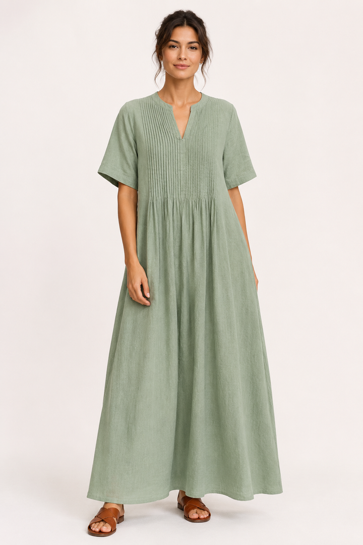 Casual maar elegante lange damesjurk met V-hals en korte mouwen. Perfect als vakantieoutfit voor de zomer.