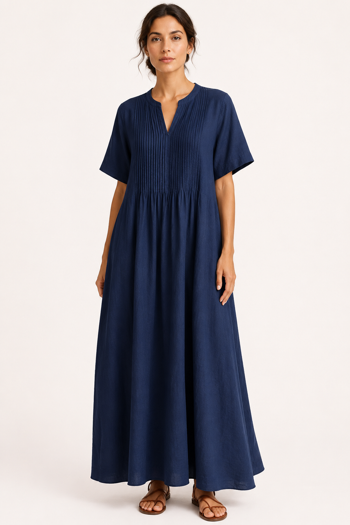 Stijlvolle dames maxijurk met V-hals en korte mouwen. Deze lange jurk is perfect voor elegante zomerse dagen.