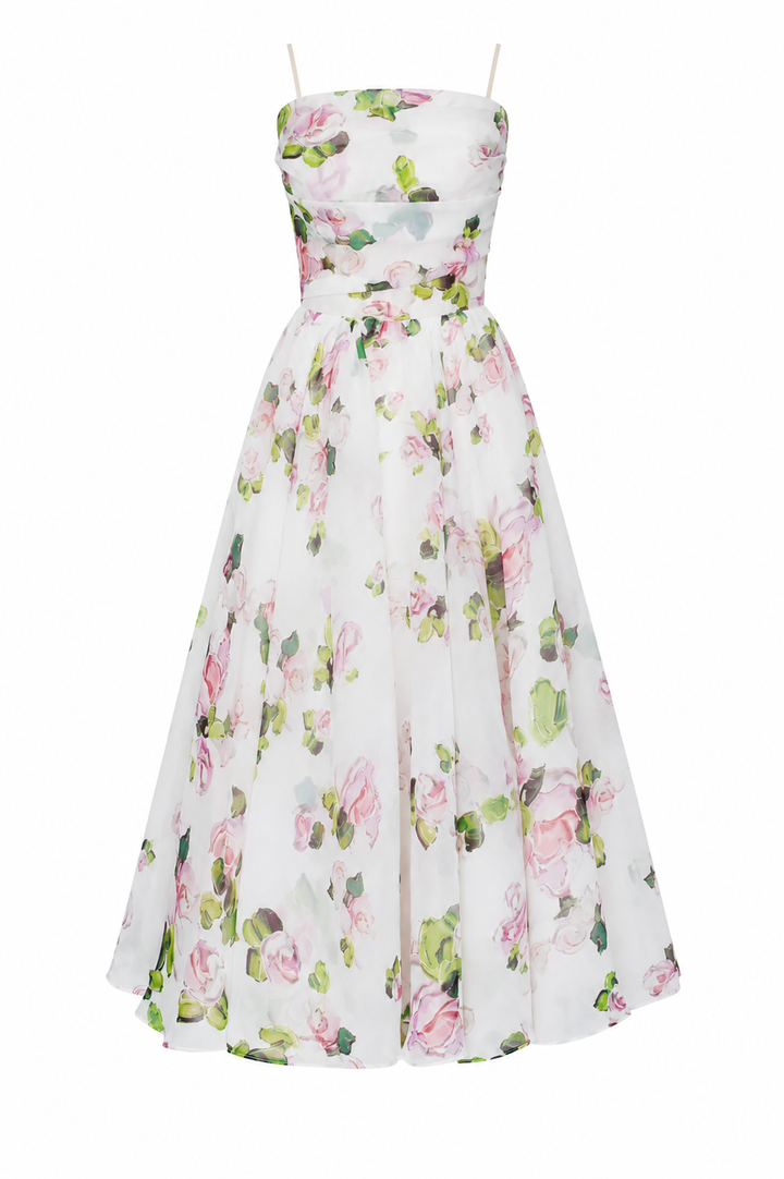 Casual gebloemde dames zomerjurk met dunne spaghettibandjes en flatterende midi-lengte voor lente/zomer.