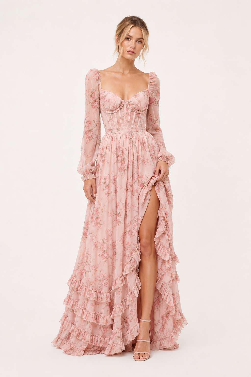 Elegante roze dames maxi jurk met bloemenprint, lange mouwen en vierkante halslijn.