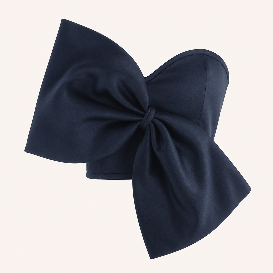 Korte dames zomer top met strik, strapless en elegant. Perfecte feestkleding voor een stijlvolle look.