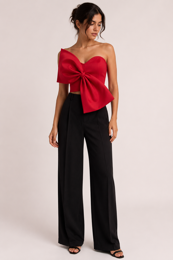Elegante korte dames top met opvallende strik, perfect als feestkleding of zomer top voor speciale gelegenheden.