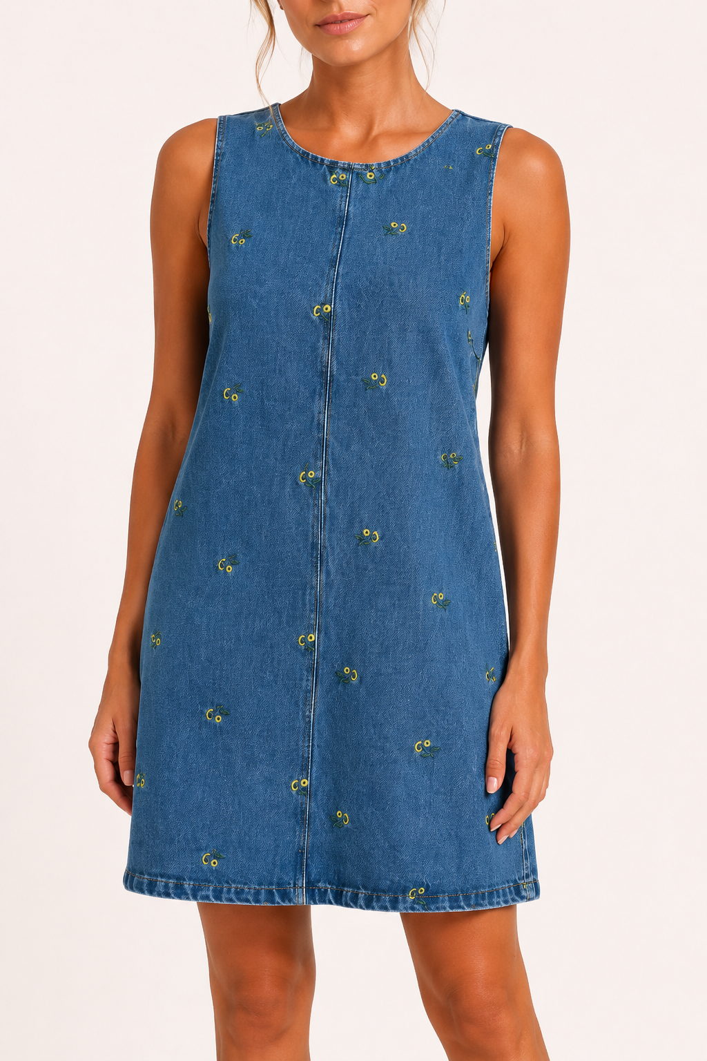 Dames zomerjurk met relaxte pasvorm, mouwloos en kort. Comfortabele casual jurk voor warme dagen.