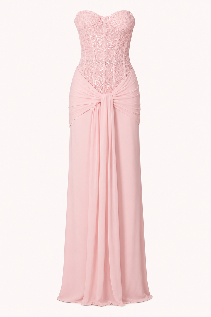 Verfijnde roze lange jurk voor dames met taille-accentuerend korsetdetail, ideaal voor een elegante look.