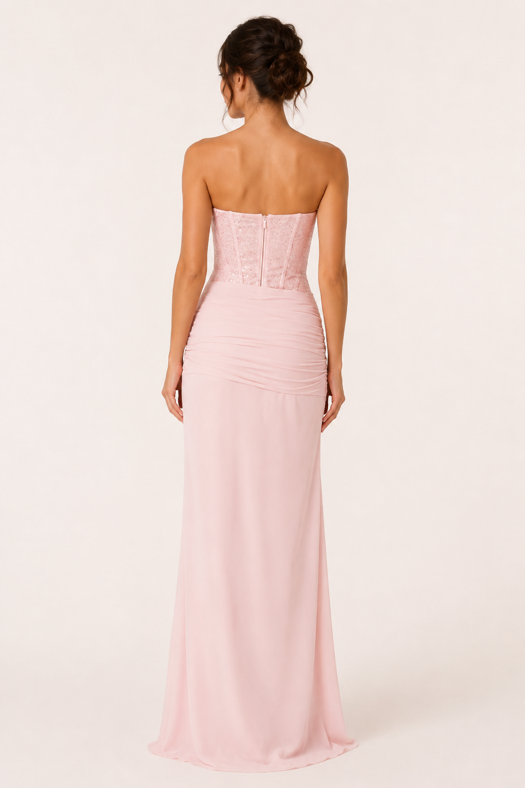 Roze avondjurk voor dames met verfijnd korsetdetail en vloeiende lange rok, elegant voor feesten.