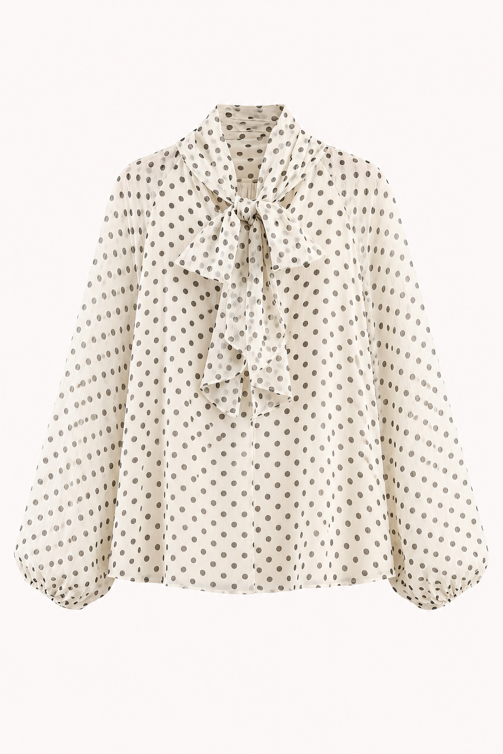 Chique beige damesblouse met bruine stippen, een elegant strikdetail en elegante pofmouwen, perfect voor damesmode.