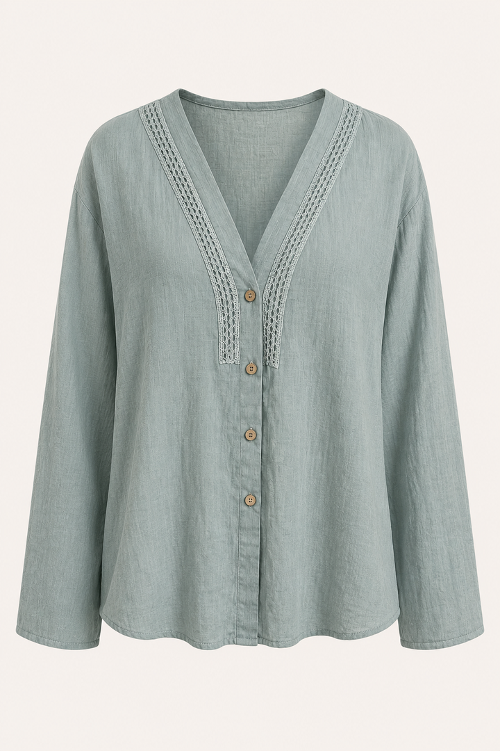 Comfortabele blauwe damesblouse met V-hals en lange mouwen, perfect voor een elegante zomerse look.