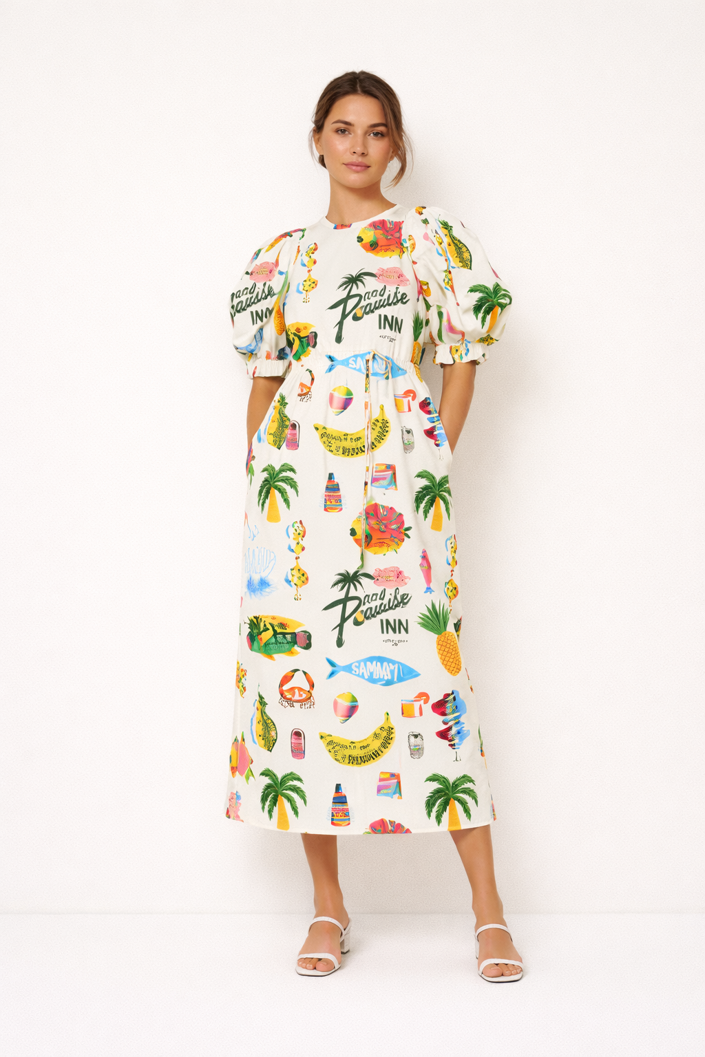 Zomerjurk dames met vrolijke casual print en elegante pofmouwen, ideaal voor lente en zomer casual dagen.