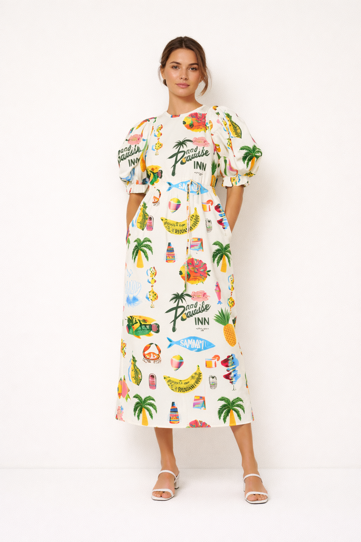 Zomerjurk dames met vrolijke casual print en elegante pofmouwen, ideaal voor lente en zomer casual dagen.