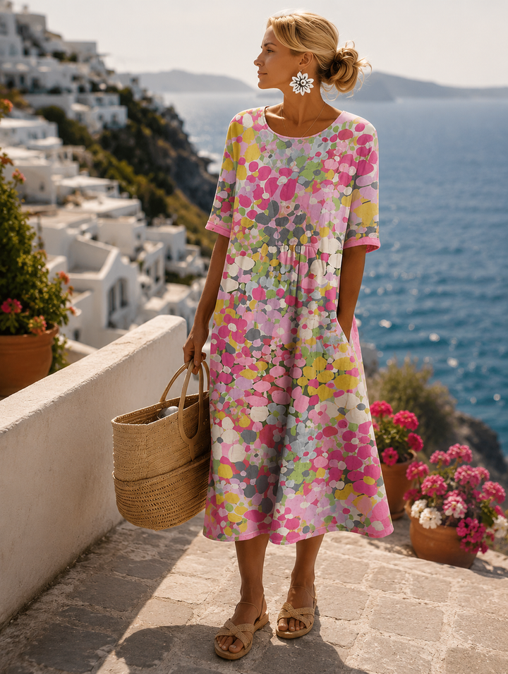 Elegante luchtige dames gebloemde midi jurk voor warme zomerdagen, ideaal voor een casual of strandlook.