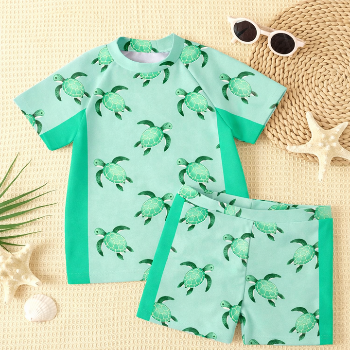Levendige jongens zwemkleding met unieke tropische camo en tie-dye print; perfect voor actieve kinderen.