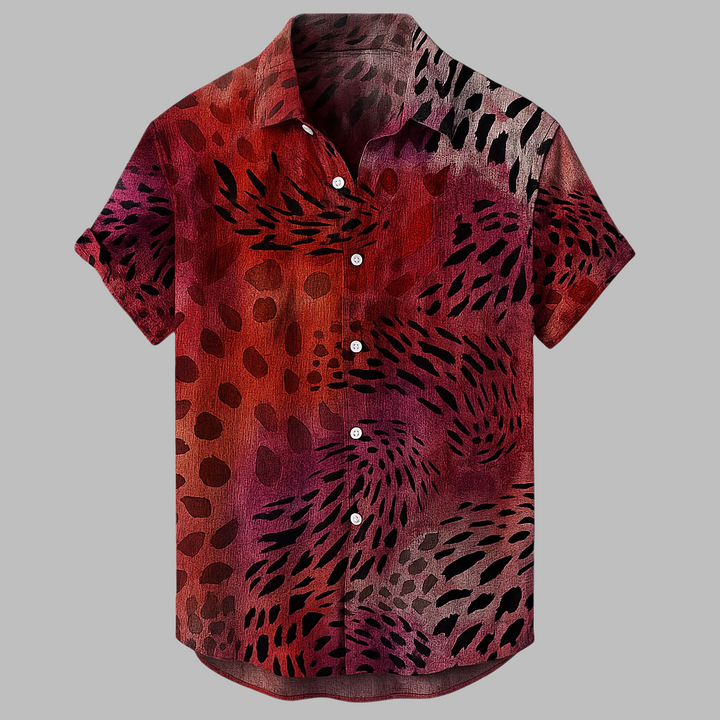 Comfortabel heren overhemd in unieke Afrikaanse stijl met levendige tribalprint en korte mouwen voor de zomer.