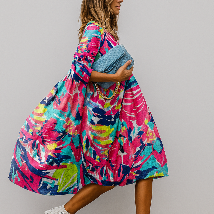 Levendige bloemenprint midi-jurk voor dames, oversized met pofmouwen; een stijlvolle keuze voor lente en zomer.