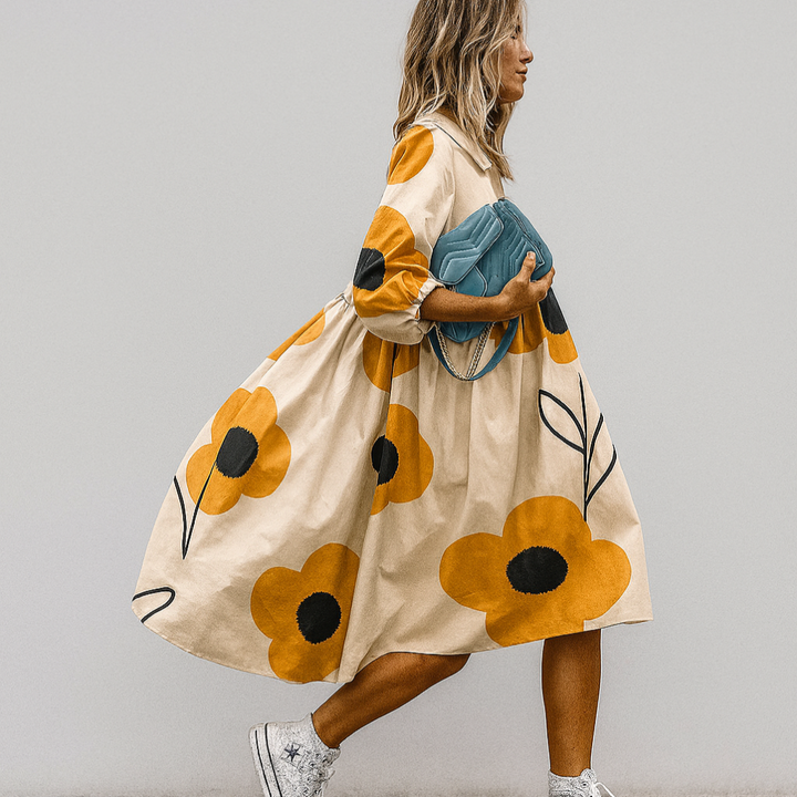 Comfortabele oversized damesjurk voor de zomer met een frisse bloemenprint, A-lijn model en casual elegantie.