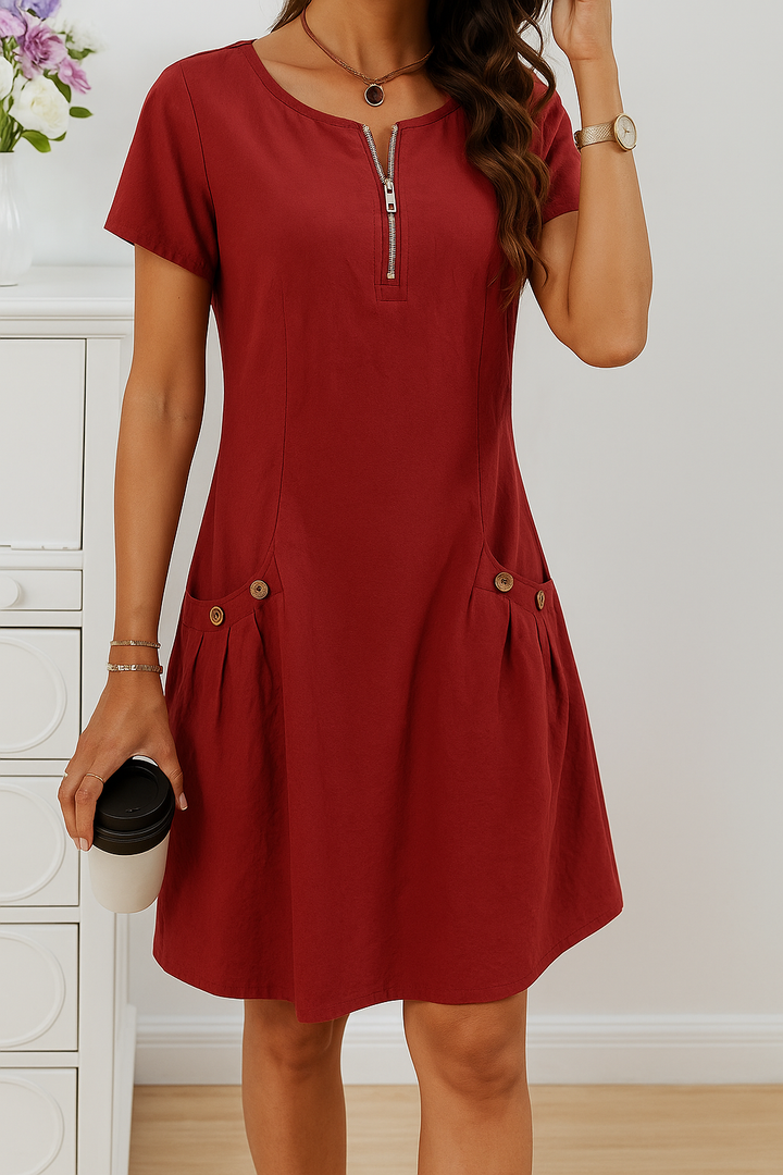 Elegante en comfortabele linnen midi jurk met zakken, ideaal voor een zomerse casual damesoutfit.
