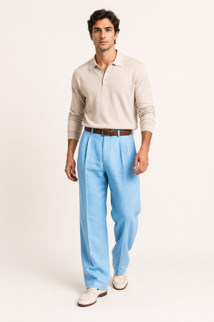 Modieuze heren plooibroek in zwart met relaxte pasvorm en wijde pijpen, geschikt voor casual en smart casual.