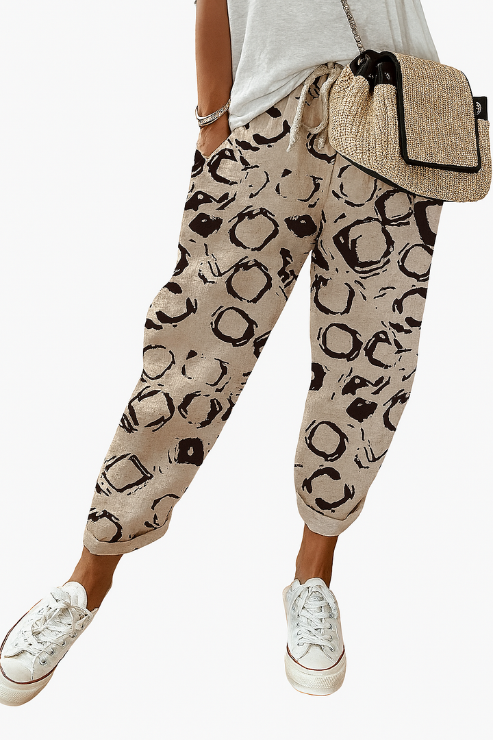 Stijlvolle bedrukte dames zomerbroek met elastische taille, perfect voor casual mode en vakantie.