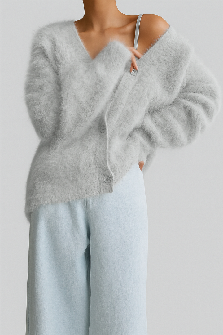 Zacht gebreid damesvest van acryl met elegante knoopsluiting, ideaal voor comfortabele herfst- en wintermode.