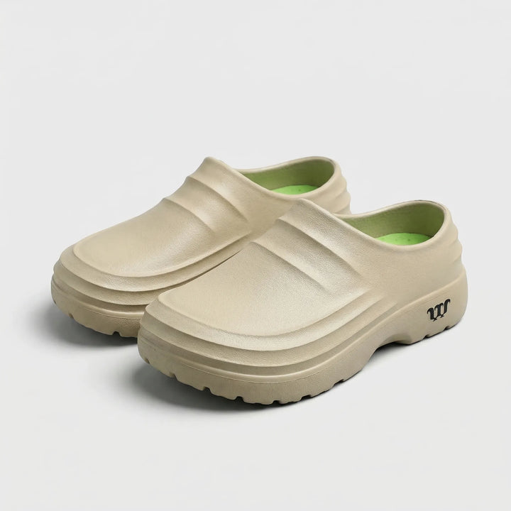 Moderne unisex slip-on klomp met robuuste dikke zool. Ergonomisch design voor dagelijks gebruik en lang staan.