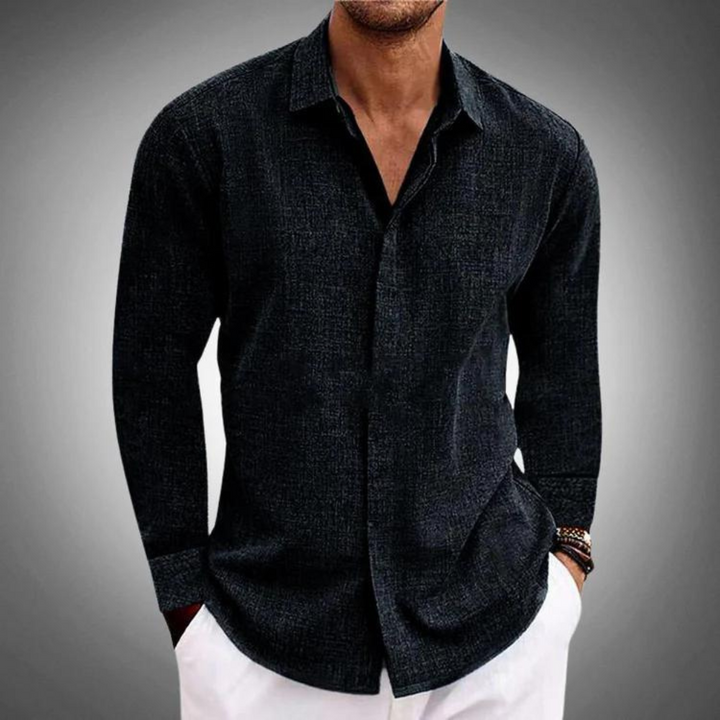 Stijlvol blauw herenoverhemd, lange mouwen, klassiek model voor lente en zomer. Comfortabele pasvorm.