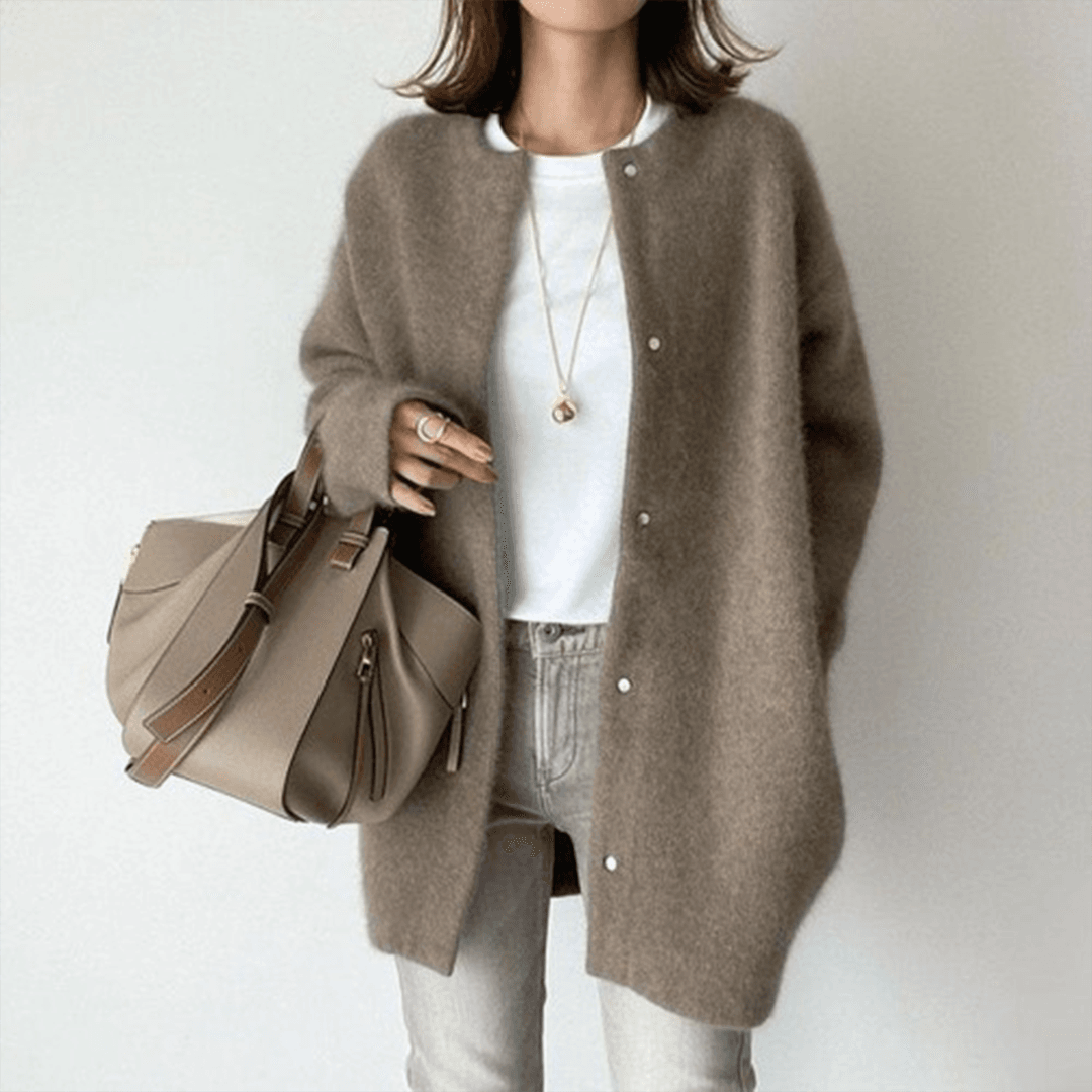 Modern damesvest met een comfortabele pasvorm. Elegant en tijdloos, perfect voor diverse mode stijlen.