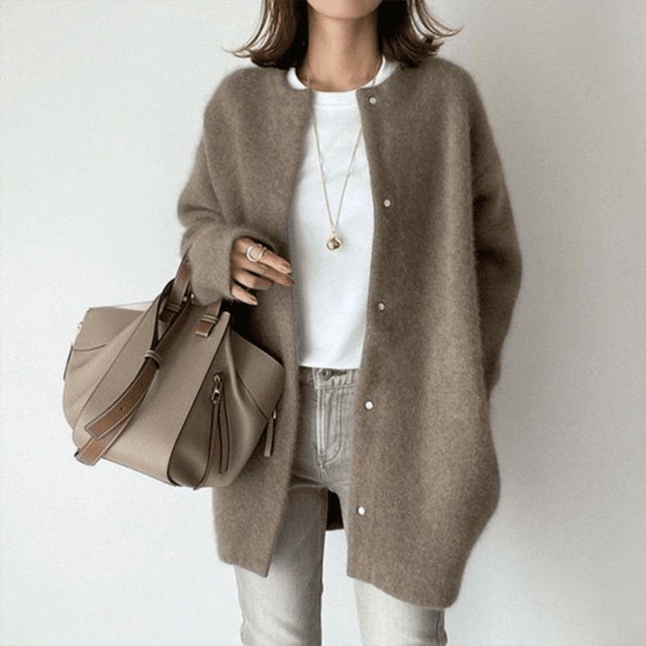 Modern damesvest met een comfortabele pasvorm. Elegant en tijdloos, perfect voor diverse mode stijlen.