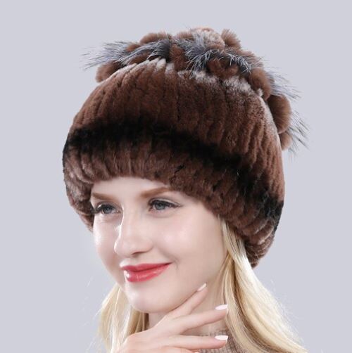 Damesmuts van hoogwaardig konijnenbont, verkrijgbaar in wit, voor een warme en comfortabele winter.