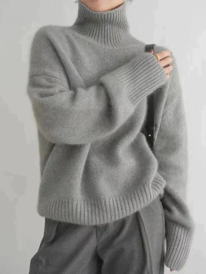 Elegante dames kasjmier coltrui van Hoymans. Tijdloze mode voor een stijlvolle winterlook.