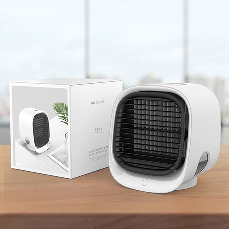 Compacte luchtkoeler en bevochtiger in één, voor optimale verkoeling en comfort in huis.